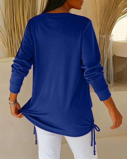 טופ דו-גווני עם פייטים – אפקט שני-באחד