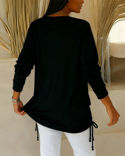 טופ דו-גווני עם פייטים – אפקט שני-באחד